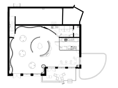 Floor plan of a modern home office with a floating desk and multifunctional space.