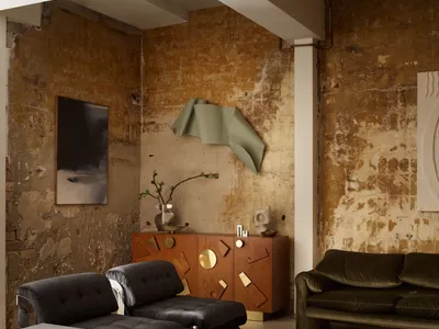 Industrial living room featuring metal and wood furniture and concrete walls.