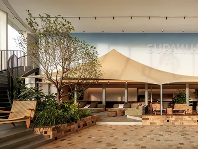 Industrial-style restaurant with brick walls and seating area