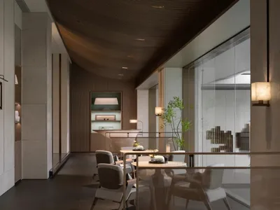 A sleek, minimalist restaurant interior featuring concrete, wooden, and glass materials and a contemporary design.