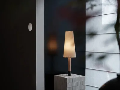 A cozy, Scandinavian-inspired living room with a warm, minimalist ambiance.