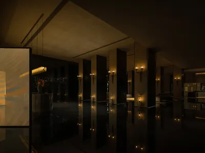 Modern hotel lobby featuring metallic accents and contemporary design elements.