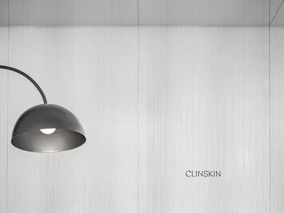 Modern, minimalist hospitality design with metallic ceiling.