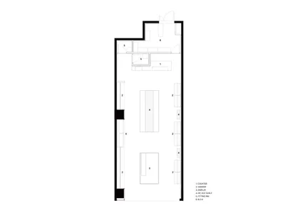 商業室內零售店中性色調平面圖，標示櫃台、展示區與吊掛區等功能區域。