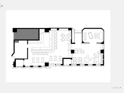 A detailed architectural layout of a modern restaurant interior, featuring contemporary furniture and design elements.