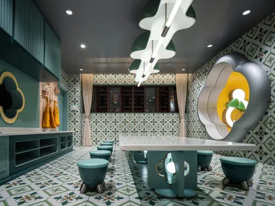 A modern restaurant interior with a tile floor, green and white color scheme, and unique lighting fixtures.