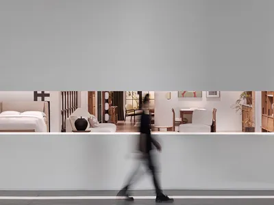 簡約臥室搭配白色家具與燈光，展現當代設計元素。