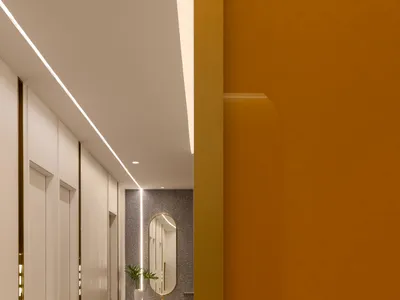 現代酒店走廊，採用混凝土地板與現代設計元素。
