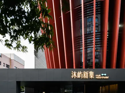 Modern hotel entrance with glass architectural elements
