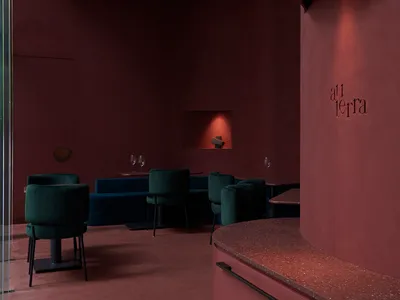 Circular bar area in a modern restaurant with red terrazzo flooring and wooden seating.