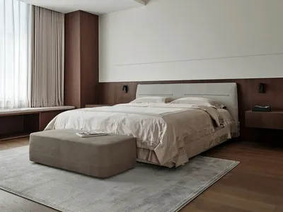 Modern minimalist bedroom featuring wood floor, upholstered bed, glass window, and floating nightstands.
