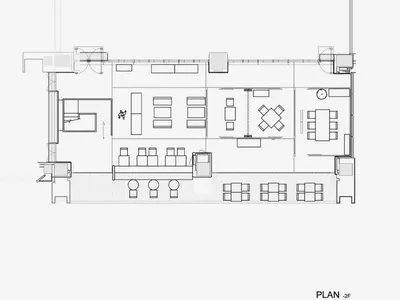A black and white floor plan of a modern restaurant showing seating arrangements, dining tables, and kitchen layout.