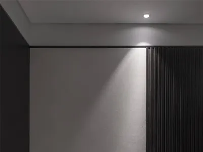 極簡設計的臥室，搭配灰色質感布料床品與木質元素。