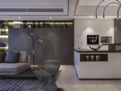Modern living room and kitchen area with metallic accent materials and minimalist design.