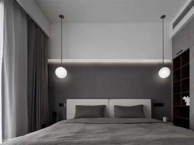 Modern bedroom with minimalist design featuring textured concrete walls.