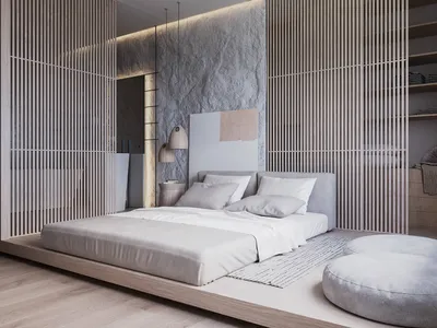 Modern minimalist bedroom featuring a low platform bed with wooden slats.