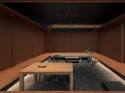 Modern restaurant interior with wooden tables and benches, concrete flooring, and minimalist design elements