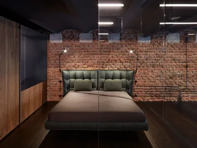 現代工業風臥室，床鋪採用皮革與金屬材質，搭配磚牆與木地板。
