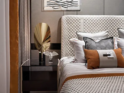 Modern bedroom featuring a wooden headboard adorned with fabric cushions.