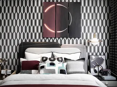 A modern bedroom with fabric headboard, metal accents, and wood elements.