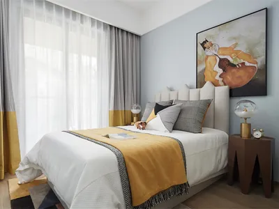 Modern minimalist bedroom with a white bed, yellow towels, and a yellow and orange abstract painting on the wall. Bedroom has