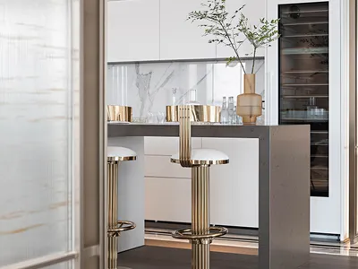 Modern kitchen featuring a concrete and marble island bar with sleek metallic stools and a vase plant decoration.