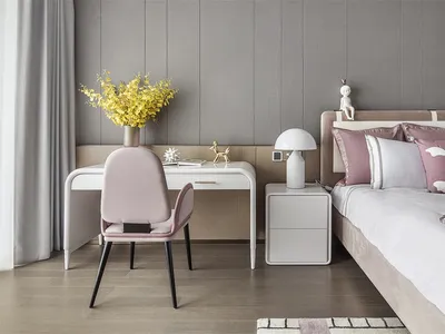 A modern bedroom featuring minimalist design, with a wooden floor, fabric furniture, and metal accents.