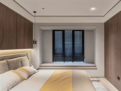 Modern bedroom featuring a bed with brown wooden frame and minimalist design.