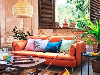 Cozy, textured living room furniture in an industrial-themed interior space.