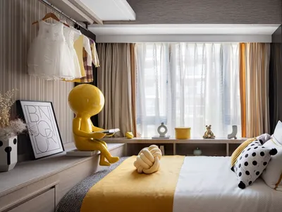 A modern children's bedroom with yellow accents, featuring a yellow stuffed toy sitting on a bed, a window with striped curta