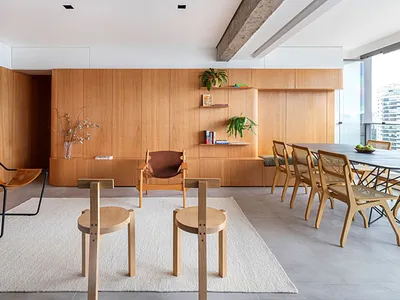 Modern interior with wooden furniture and a minimalist aesthetic.