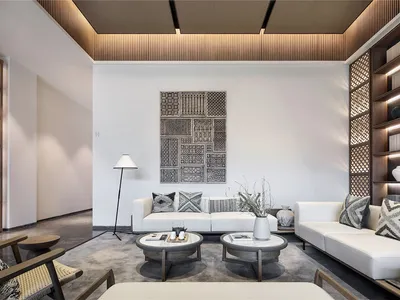 A minimalist living room with neutral tones and modern furniture.