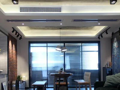 Industrial-style living room with wooden furniture and floors.