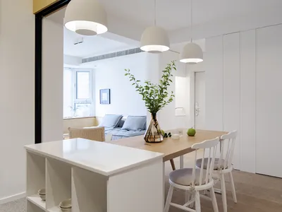 A modern kitchen with wooden elements and minimalist design