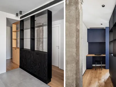 Modern home office space featuring concrete shelving and wooden floor.