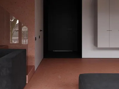 Modern minimalist bedroom featuring white concrete walls and floor, with black door and furniture accents.