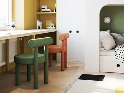 A minimalist bedroom with white plywood walls, furniture, and storage