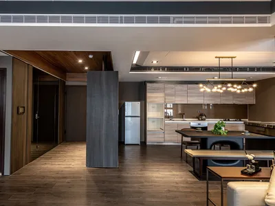 Modern kitchen with wooden countertops, cabinets, and floor tiles.