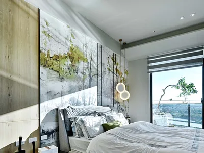 Modern minimalist bedroom showcasing hardwood flooring, a bed with a gray headboard and white bedding, and a large abstract p