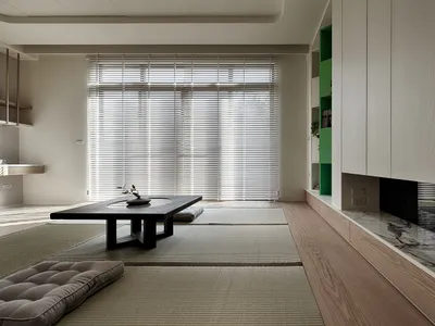 Minimalist living room with wooden furniture and a marble countertop.