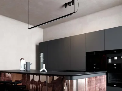 A modern kitchen featuring a metallic counter-top with sleek black cabinetry and hardwood flooring.