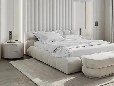 Modern minimalist bedroom with white upholstered bed and cloud-shaped chandelier.