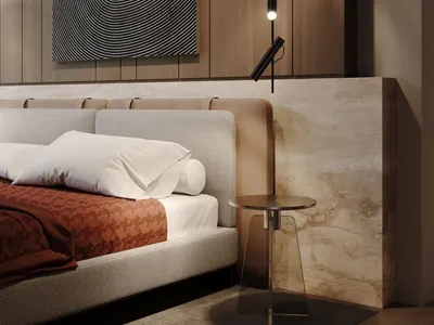 A modern minimalist bedroom featuring a white upholstered bed with a geometric headboard, an abstract black and white spiral