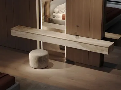 Modern bedroom featuring marble finishes and contemporary design elements.