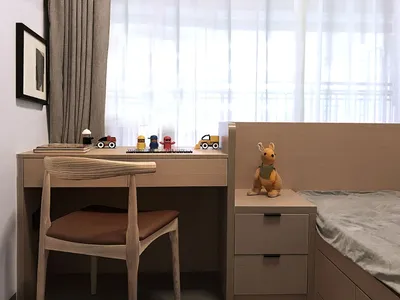 A modern children's bedroom featuring wooden furniture and toys on shelves.