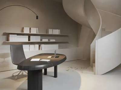 A modern, minimalist home office with a concrete desk, gray chair, and floating bookshelves.