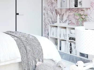 Modern bathroom with floral wallpaper, bookshelves, and a chandelier.