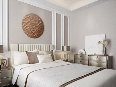 Modern bedroom featuring contemporary design elements with metal headboard, beige walls, and gold accents.
