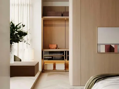 A modern minimalist bedroom featuring a wooden floating bed frame and a large wardrobe with integrated lighting.