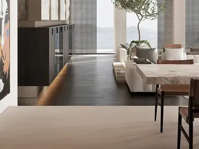 現代極簡客廳，混凝土牆面與地板，大型落地窗可眺望海洋。